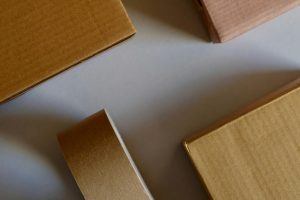 brown wooden board on white surface
