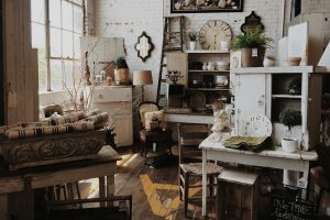 white wooden cabinet near table inside room